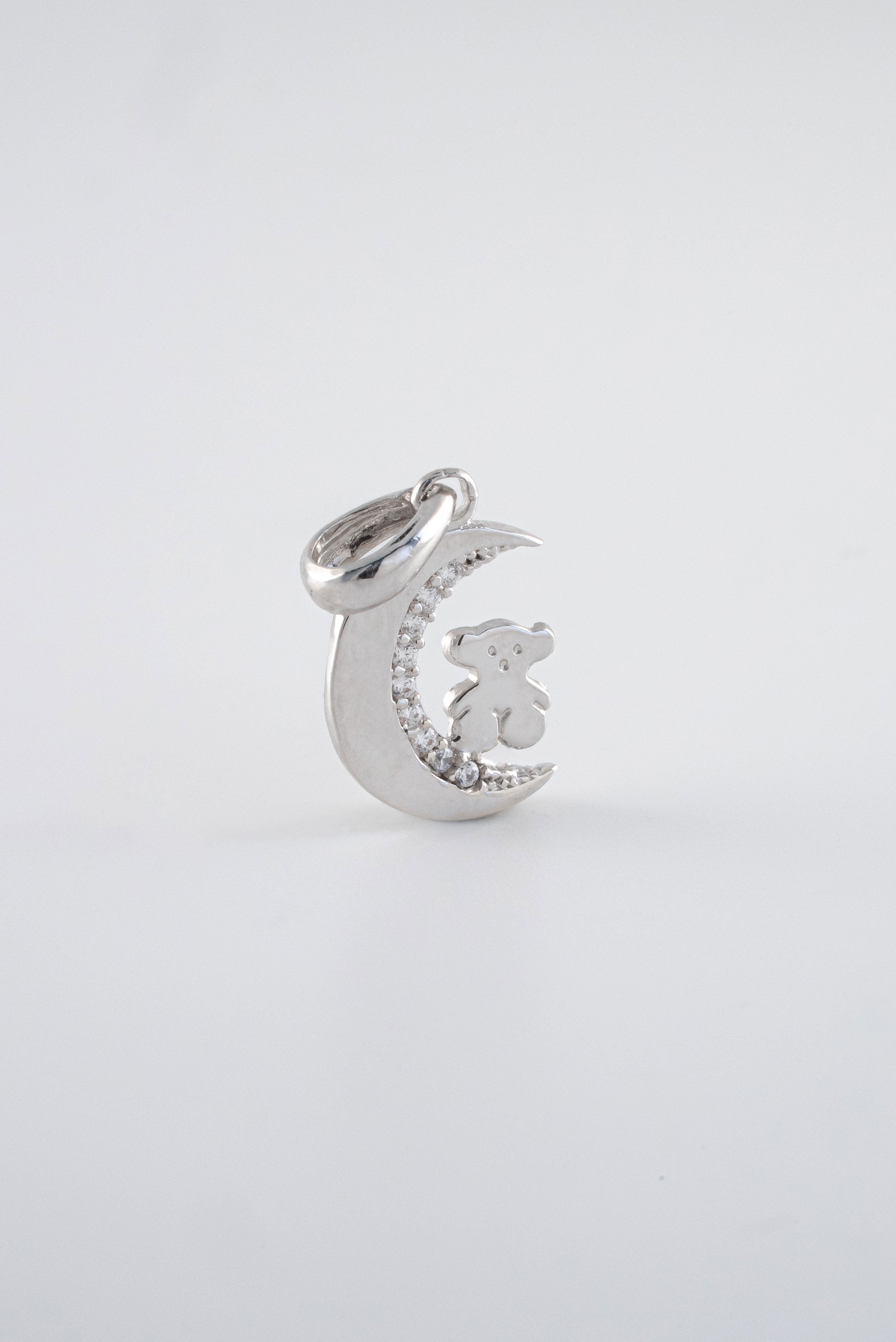 Dije Luna Circones Oro Blanco 18k / NA102 / M: 1,8 gr x 1 cms / P: 0,8 gr