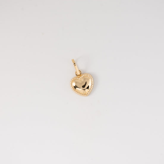 Dije Corazon Liso Oro Amarillo 18k / NA102 / M: 1.5 cms x 1 cm / P: 0.6 gr