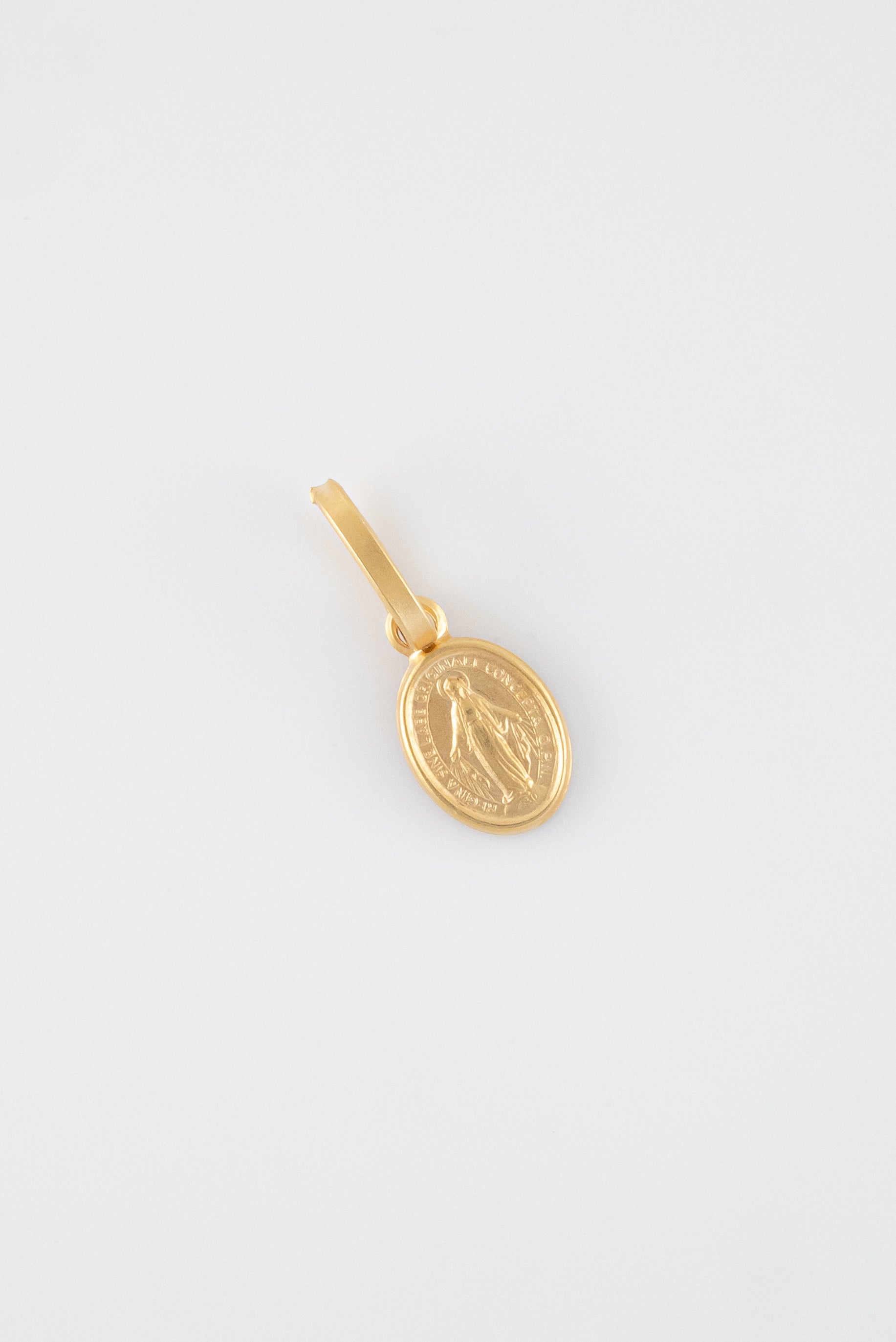 Dije Virgen Milagrosa Oro Amarillo 18k / ITA69 /M: 1,5 cms x 5 mm / P: 0,6 gr