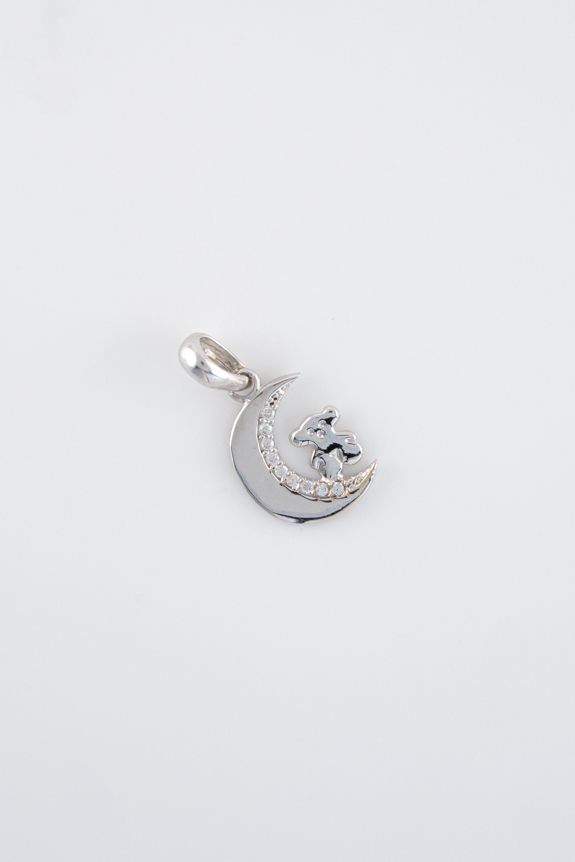 Dije Luna Circones Oro Blanco 18k / NA102 / M: 1,8 gr x 1 cms / P: 0,8 gr