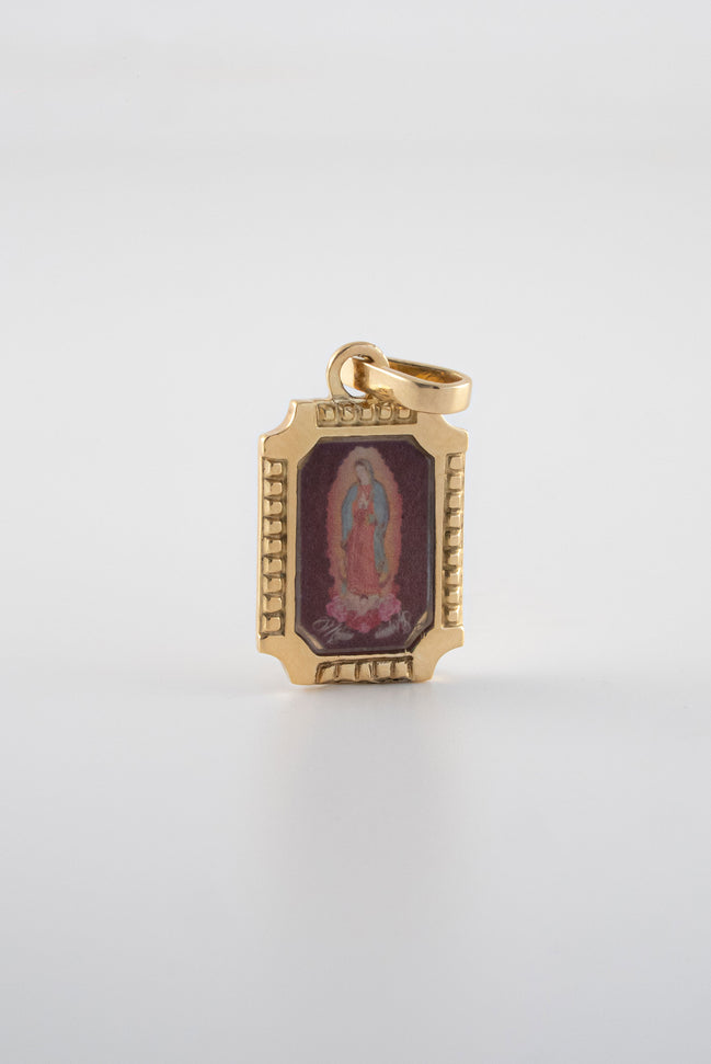 Dije Virgen Guadalupe Oro Amarillo 18k / NA101 / M: 2,5 cms x 1,2 cms / P: 2,8 gr