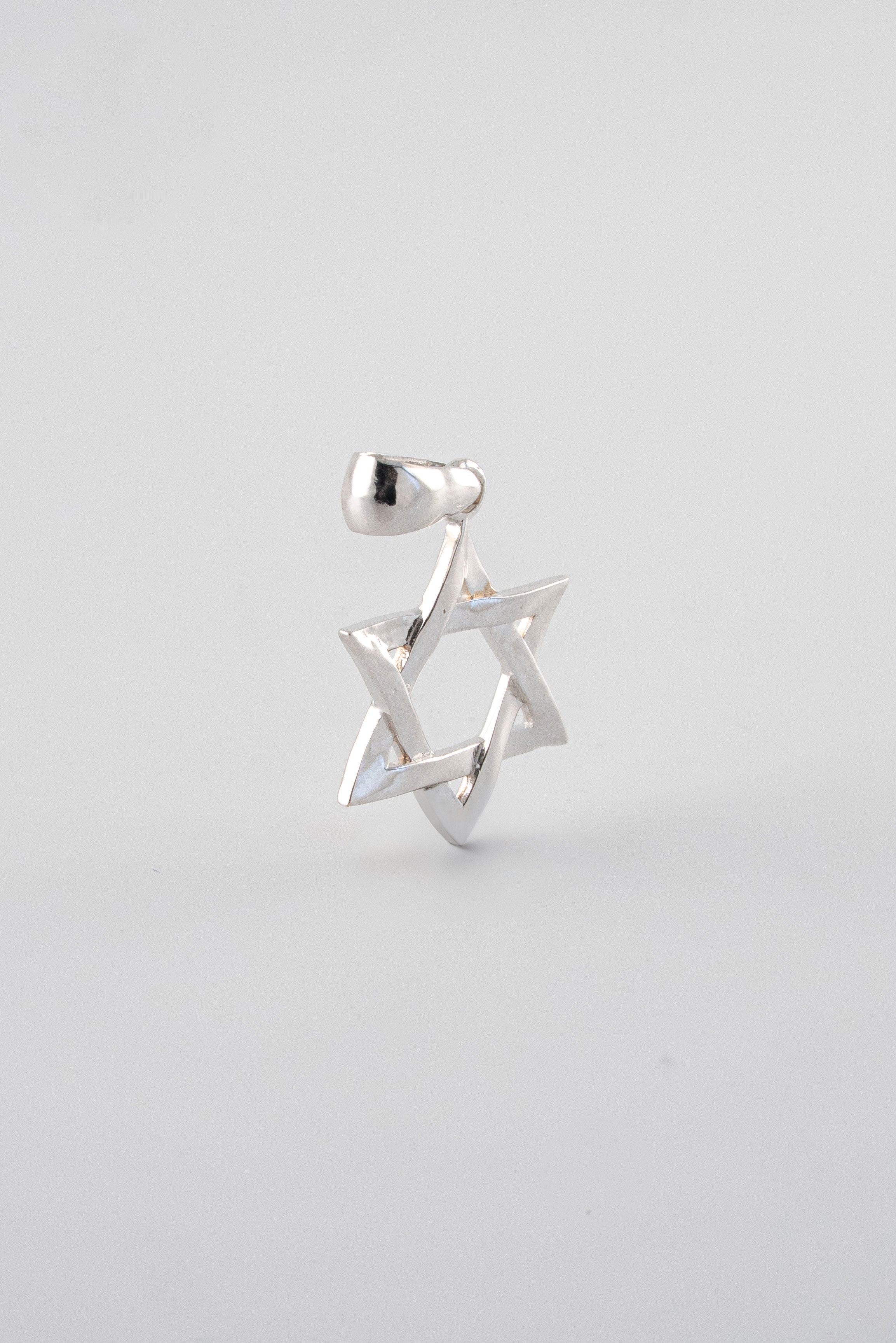 Dije Estrella David Lisa Oro Blanco 18k / NA102 / M: 2 cms x 1,2 cms / P: 1,3 gr