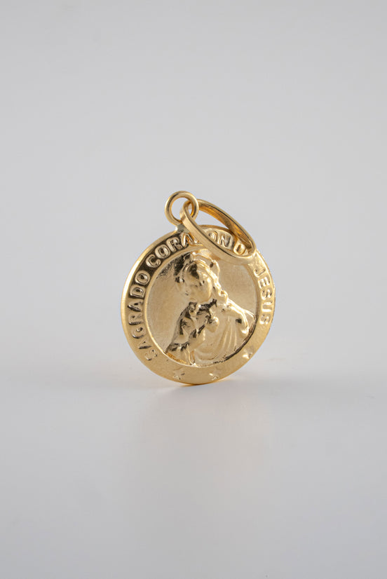 Dije Sagrado Corazon Liso Oro Amarillo 18k / NA102 / M: 1,2 cms / P: 0,8 gr