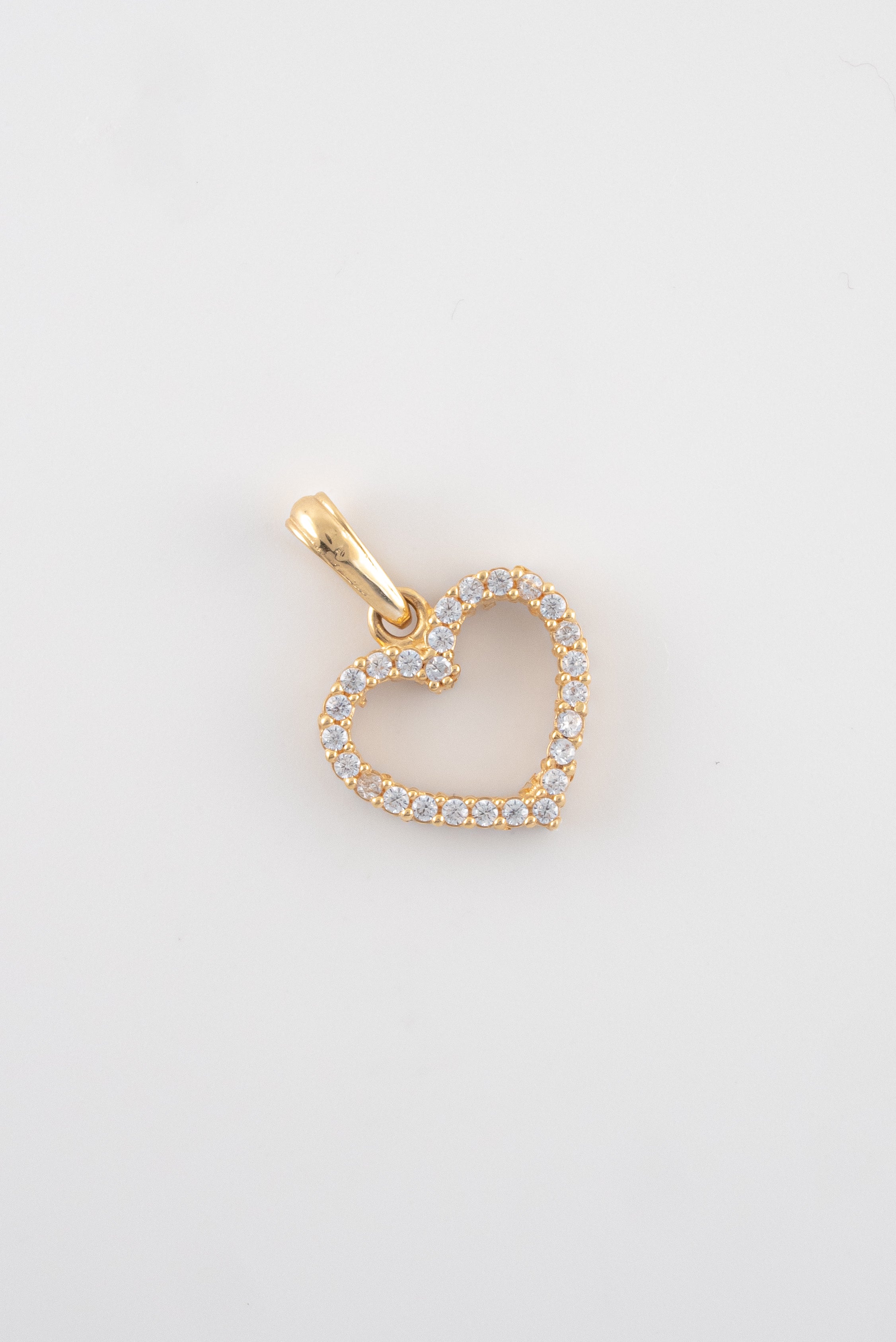 Dije Corazon Circones Blancos 18k oro amarillo / 1,48 gr - M: 2 cms x 1,5 cms  Nacional