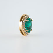 Dije Esmeralda Ovalada y Diamantes Oro Amarillo 18k / DED54 / E:0.60 quilates D:0,07 quilates / M: 1 cms x 8 mm