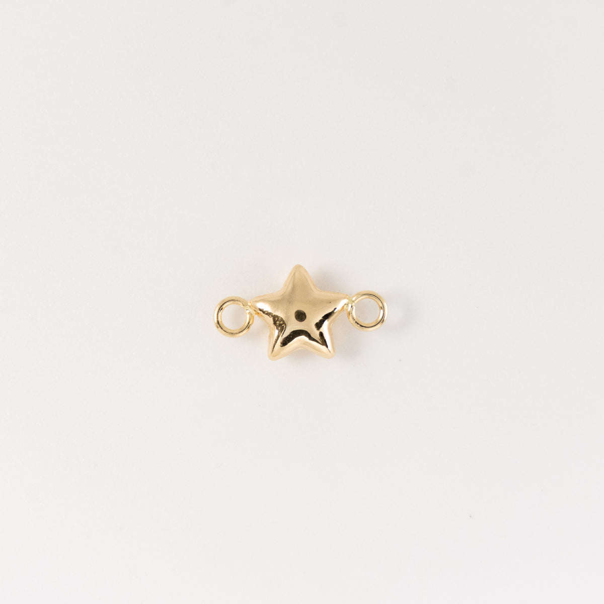 Herraje Estrella Liso Oro Amarillo 18k / NA100 / M: 0.7 mm x 1.3 cms / P: 0.3 gr